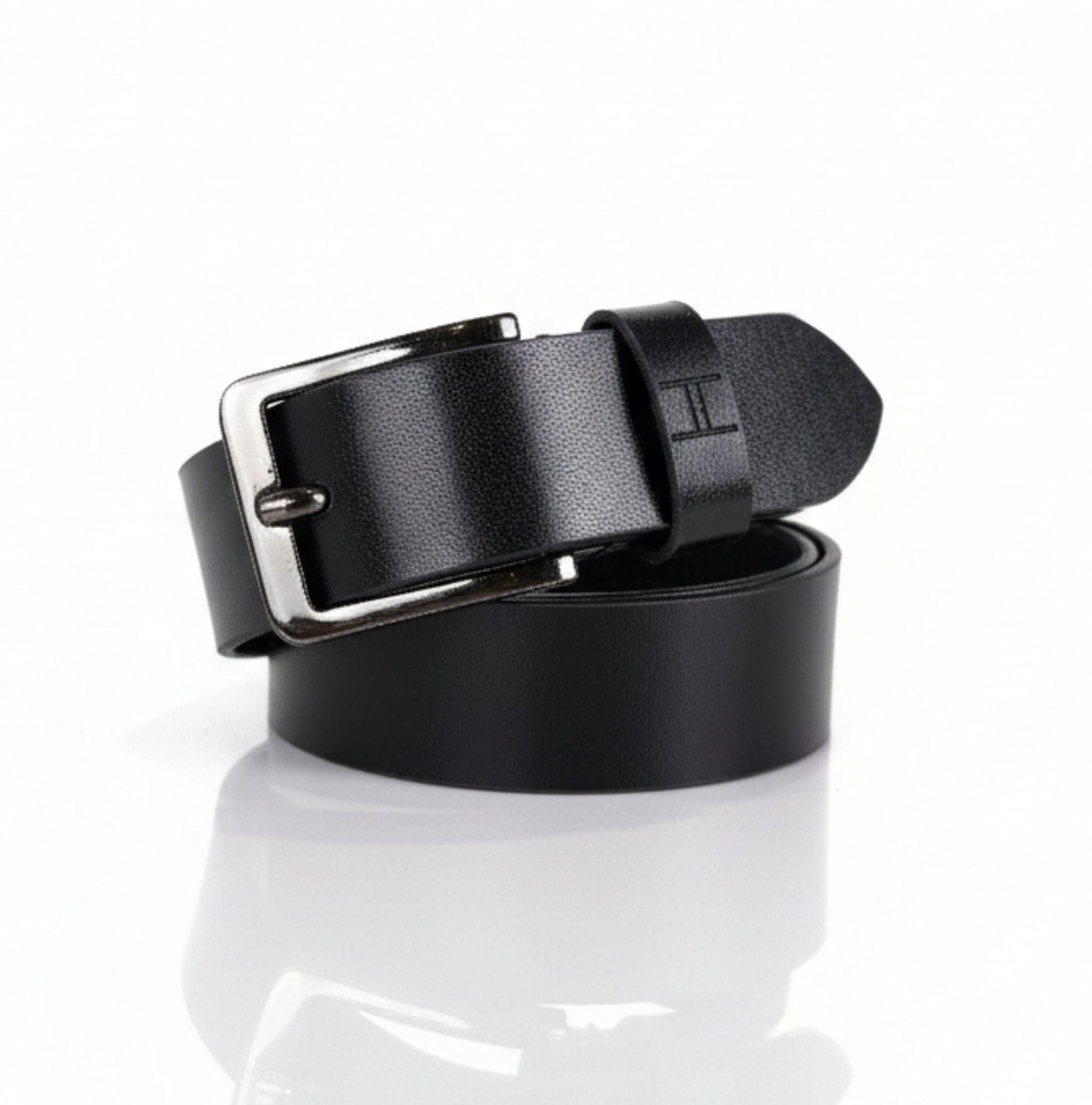 Black leather belt with silver buckle on a white background