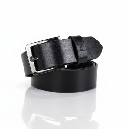 Black leather belt with silver buckle on a white background
