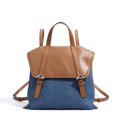 Backpack with brown top section and blue bottom section on a white background