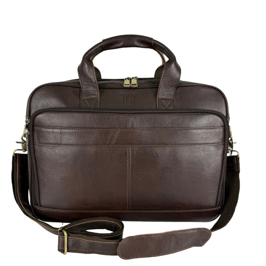 Brown leather briefcase with shoulder strap on a white background