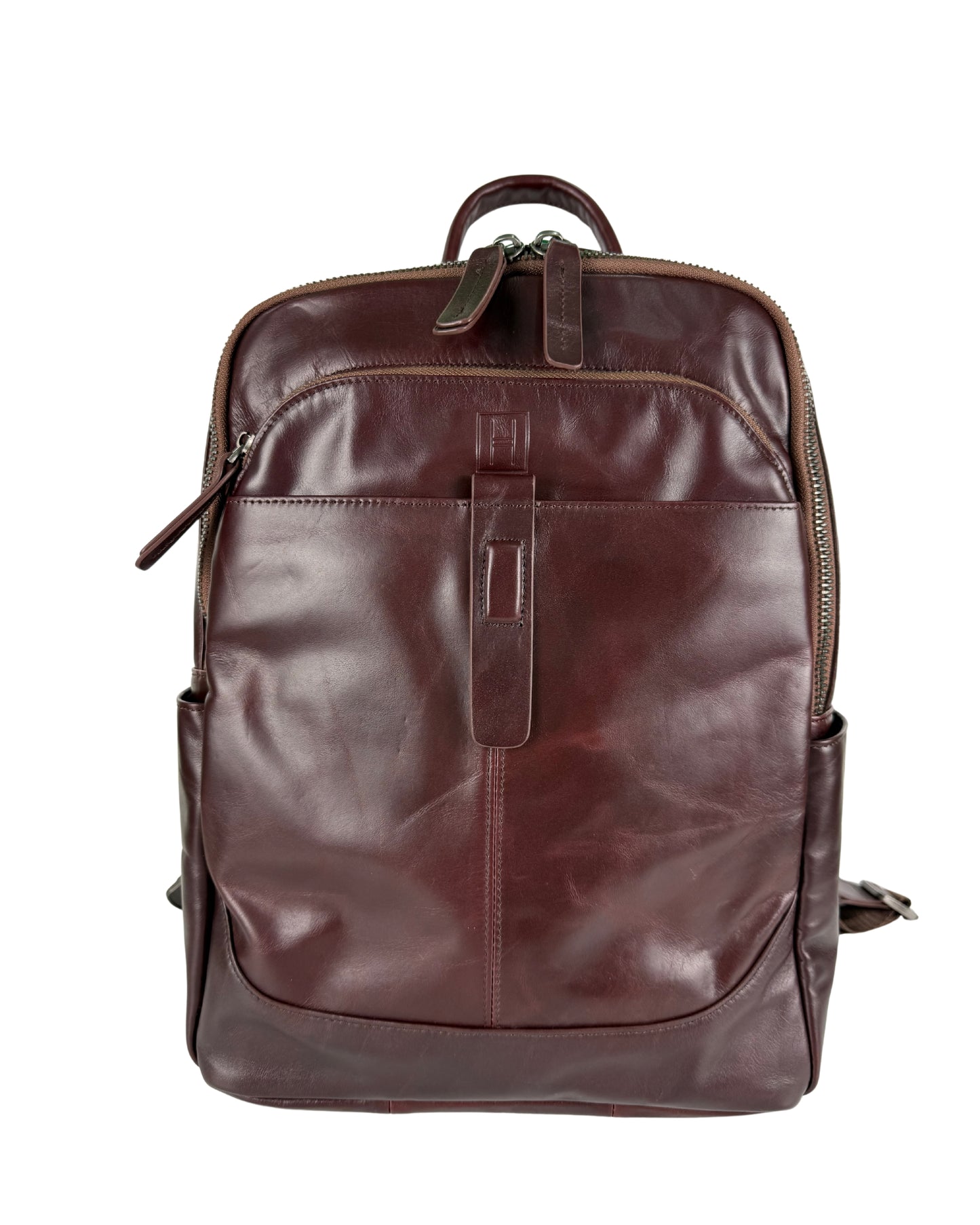 Brown leather backpack on a white background