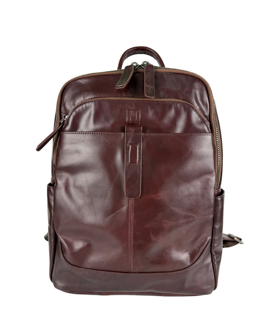 Brown leather backpack on a white background