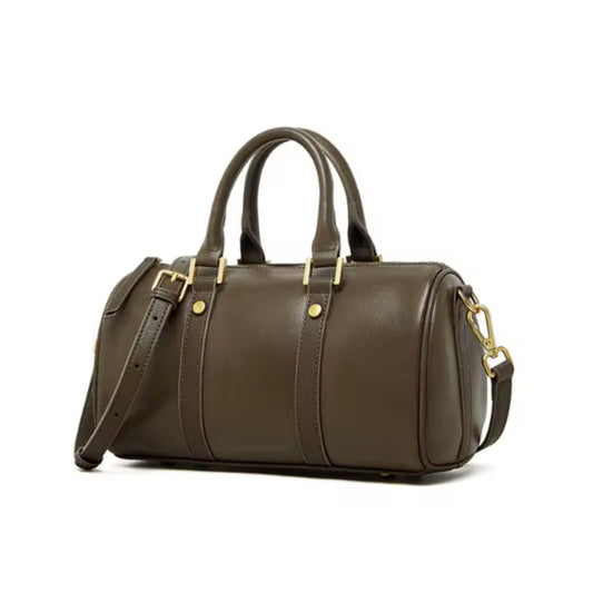 Brown leather duffel bag with gold accents on a white background