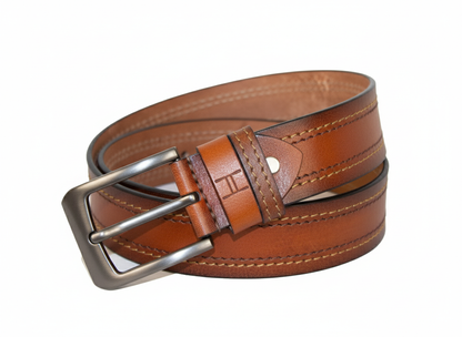 Brown leather belt with a silver buckle on a white background