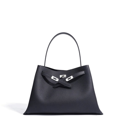 Black handbag with a silver clasp on a white background