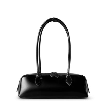 Black handbag with a bow detail on a white background