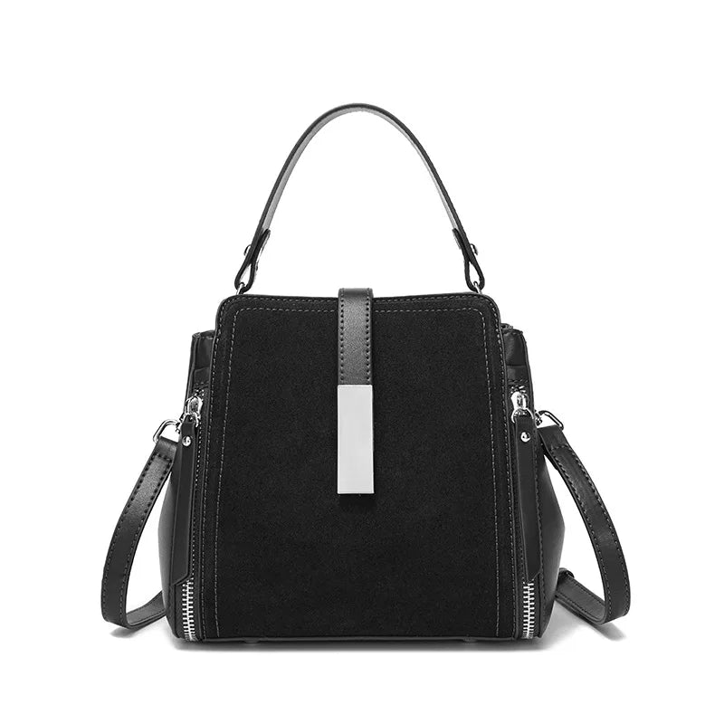 Black handbag with a silver accent on a white background
